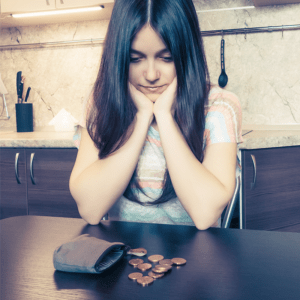 women at the table look disappointed at the amount of money on the table